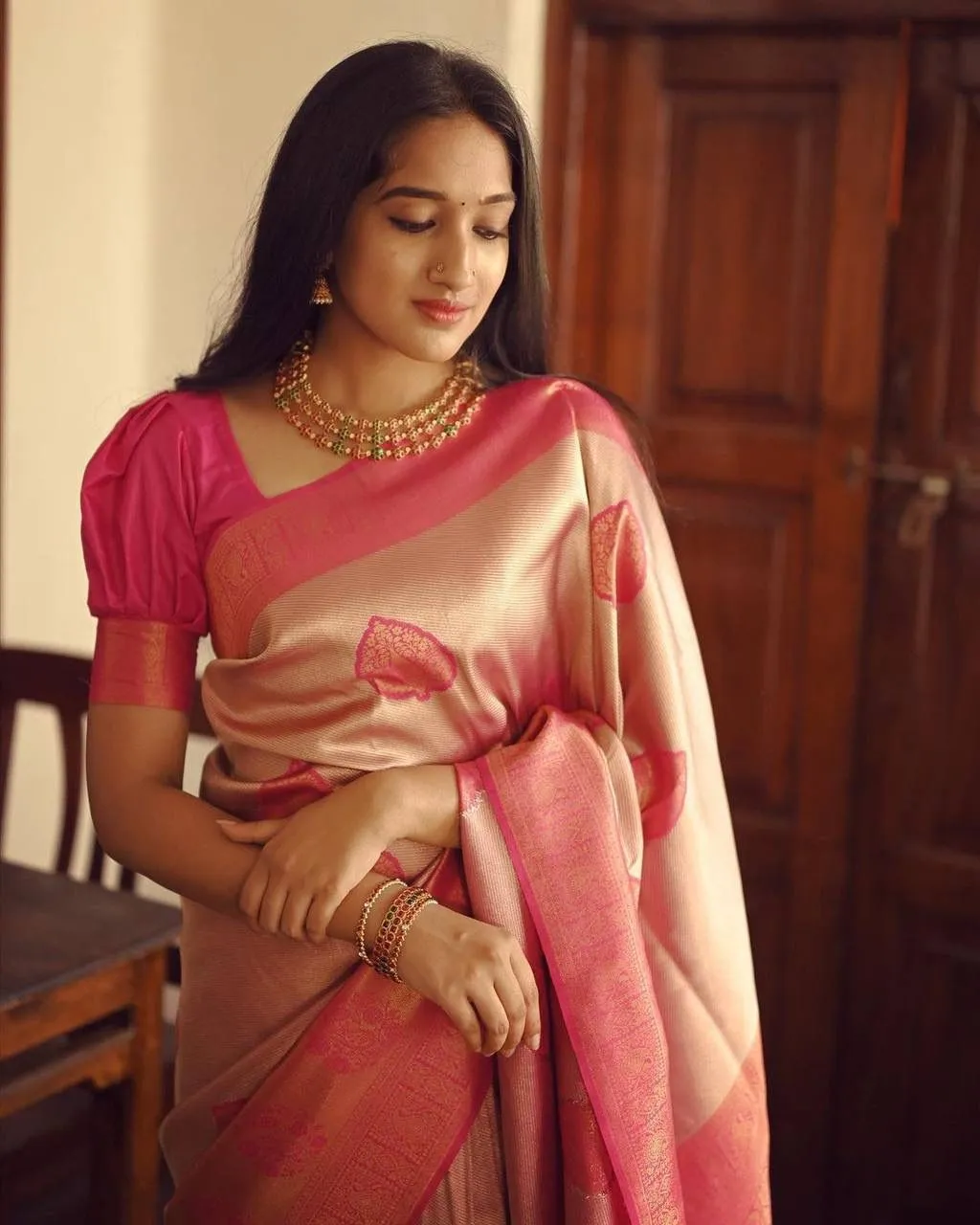 Flattering Peach Soft Silk Saree With Unique Blouse Piece